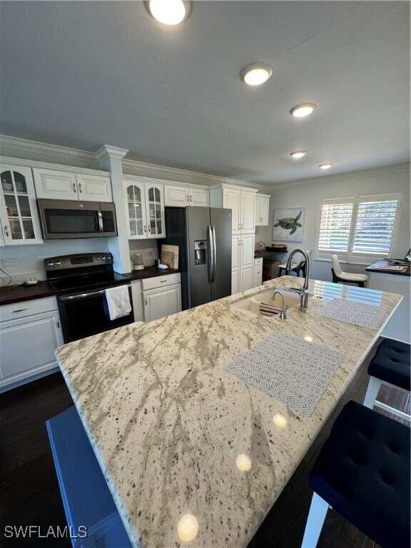 Building Photo - 5975 Bloomfield Cir Unit C107 Rental