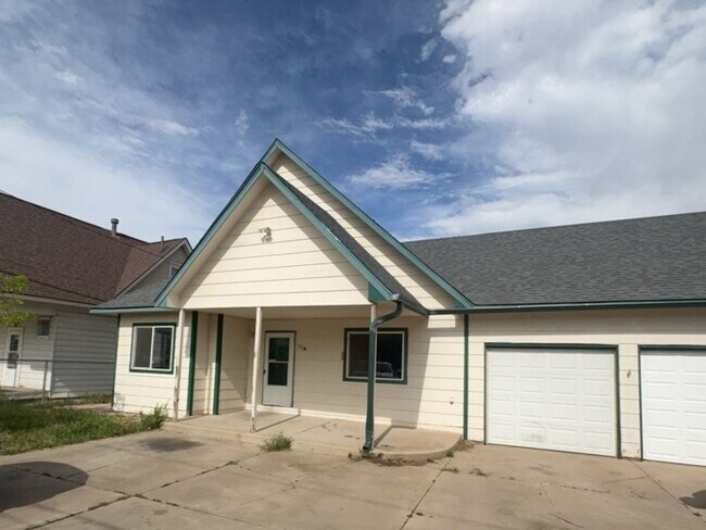 Photo - Fully Renovated 3 Bed 2.5 Bath Townhome w/ 1 Car Garage & Yard!