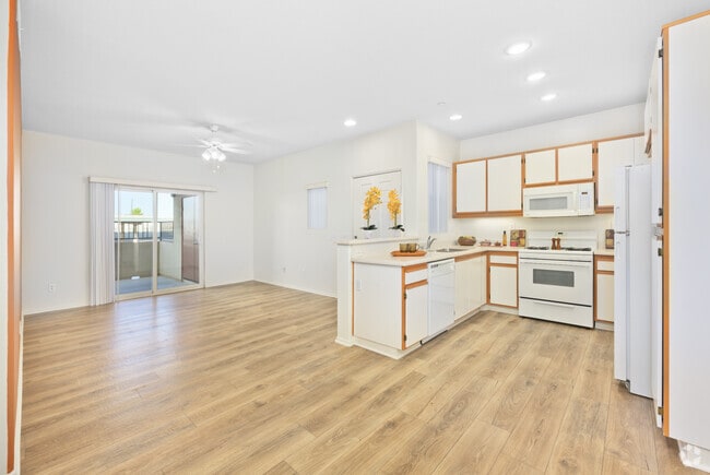 2BR, 2BA - 926SF - Kitchen and Living Room