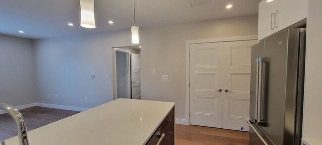 Photo - Large 2bd/2bath with Garage parking! Steps to Commuter Rail!
