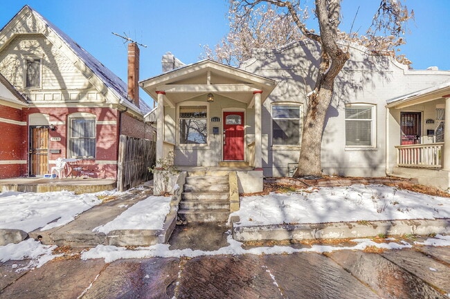 Photo - $2,100 - 2 bed, 1 Bath Townhome in Denver with AC, In Unit Laundry, and Yard!