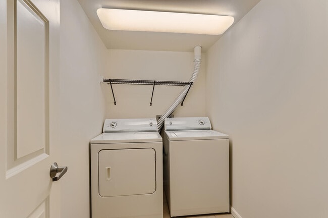Townhome Laundry Room - Village Plaza Apartments
