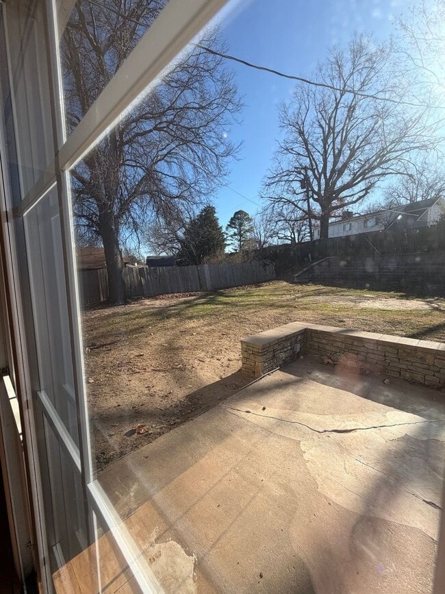 Photo - 2 story house for lease. Open floor plan in kitchen & living. Lots of storage. Large fenced backy...