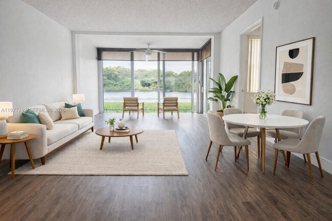 Building Photo - 9450 Poinciana Pl Unit 103