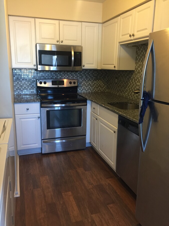 Updated pictures to come... sample of Apt A kitchen - 1113 Vincent Rd Casa Adosada