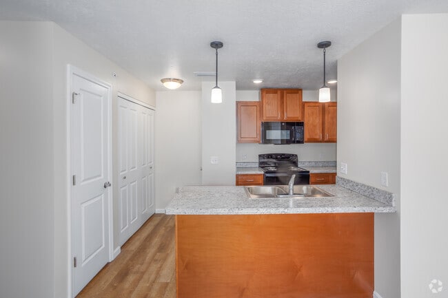 2BR, 1BA - 807SF - Kitchen and Dining Room