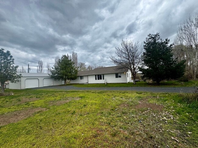 Building Photo - In The Country But Near Town!! With A Shop!! NO PETS!!