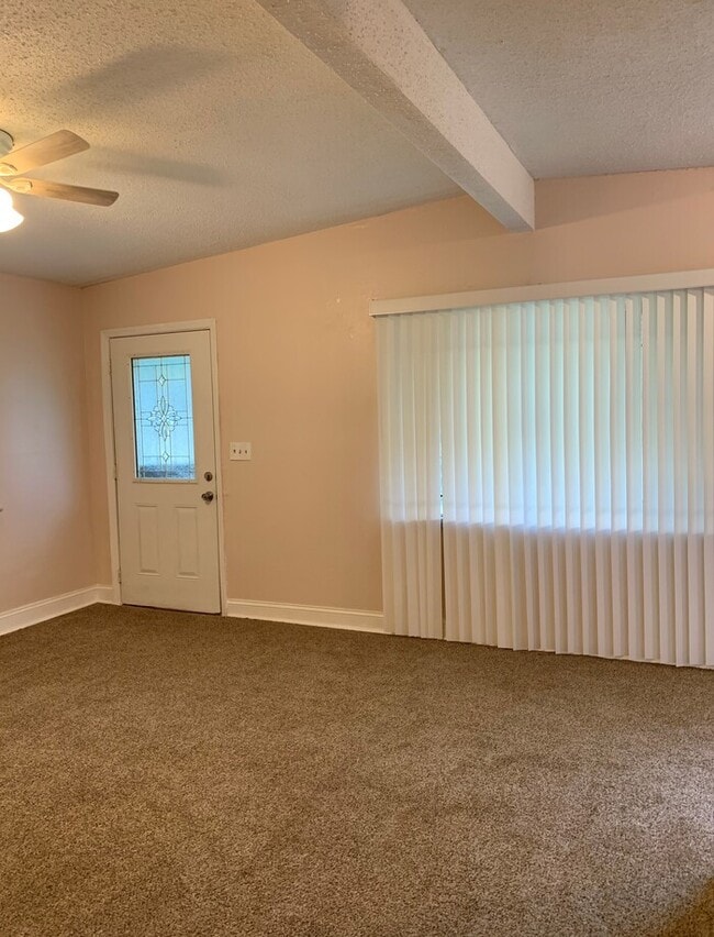 Photo - Spacious Backyard And Screened Porch In This Cozy 3 Bedroom Home