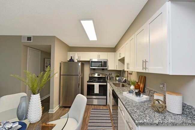 Kitchen + Granite Counters - Park 1Eleven Rental