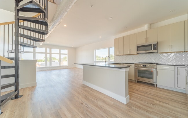 Kitchen, Living Room & Staircase to private rooftop deck - 428 Penn Ave Apartments Unit 3rd Floor