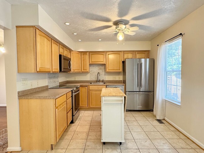 Photo - Bright Townhouse with Finished Basement, F...