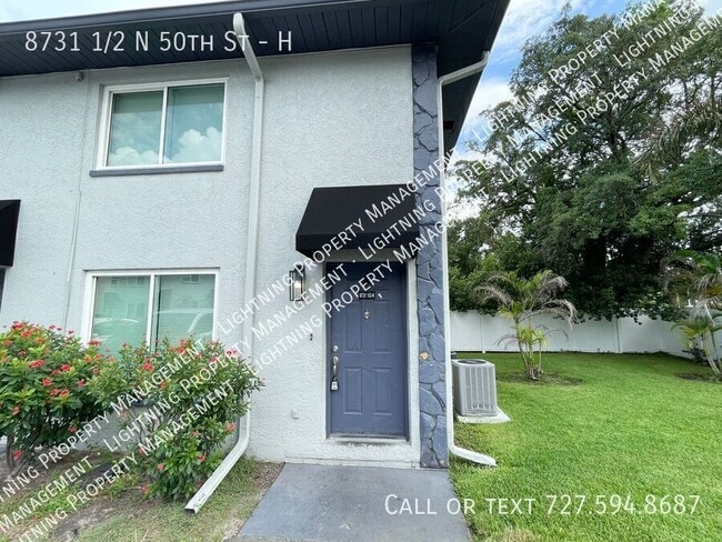 Building Photo - 8731 1/2 N 50th St-H Unit H