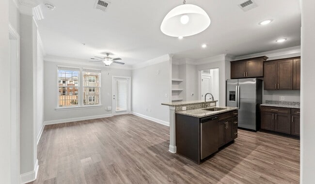 Modern ktichen and spacious living area - Olde Towne Residences