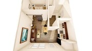 First floor studio apartment featuring private bedroom with barn door.