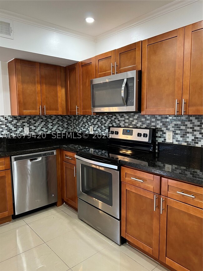 Photo - 8721 Wiles Rd Unit 306