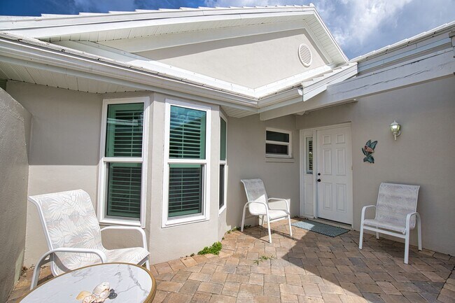 Photo - Seasonal Short-Term 2 Bed 2 Bath Heated Pool Villa with a Den in Harrington Lakes at Planation Go...