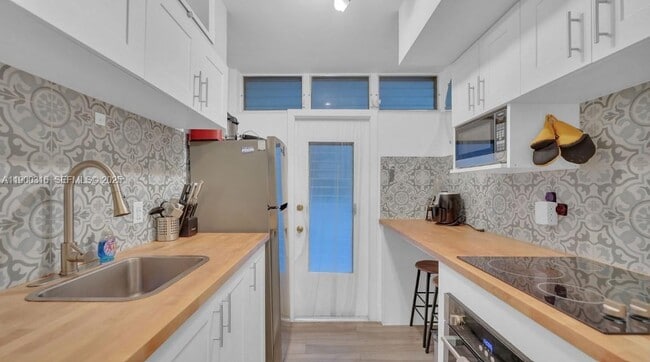 Building Photo - 1400 Pennsylvania Ave Unit 15