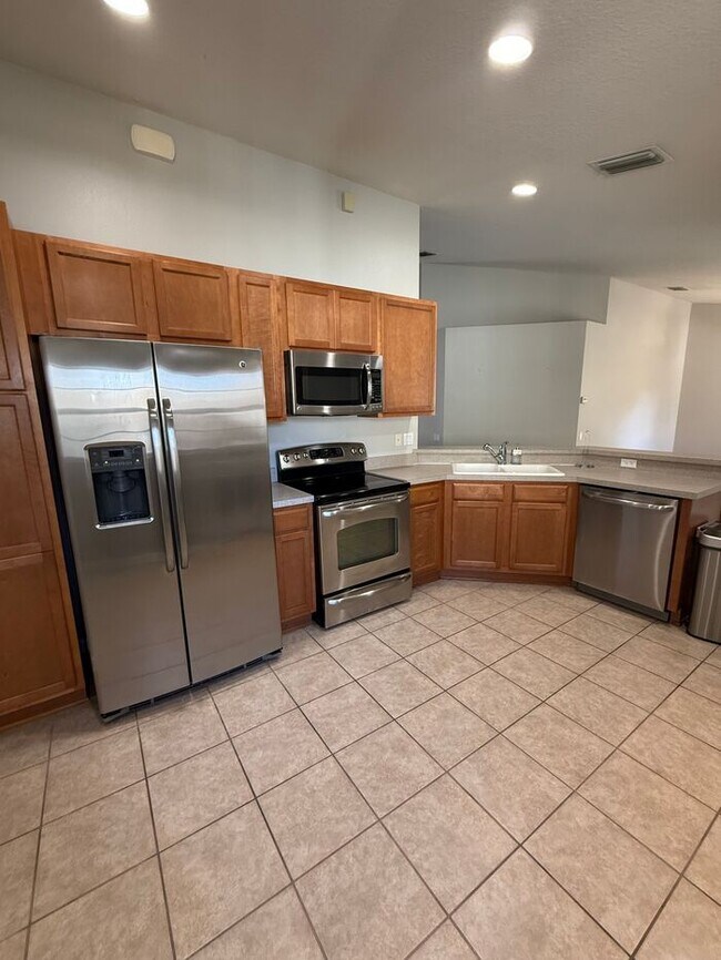 Photo - 3BR 2BA w/ Screened Patio + Pool/Gym Access in Gated Villa Serena