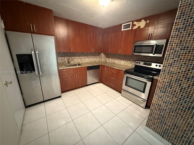 Photo - 401 Golden Isles Dr Unit 202