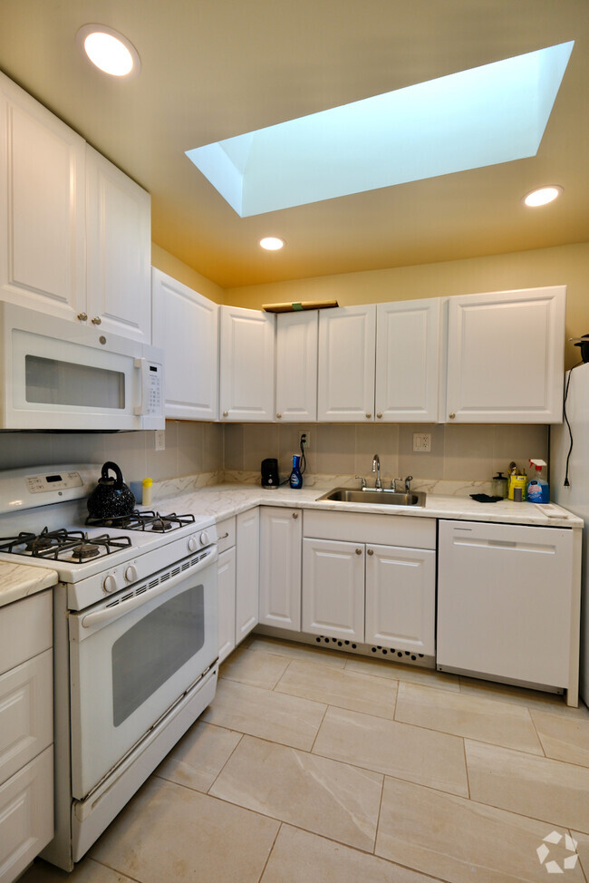 Kitchen with a skylight - 227 1/2 E Victoria St Rental