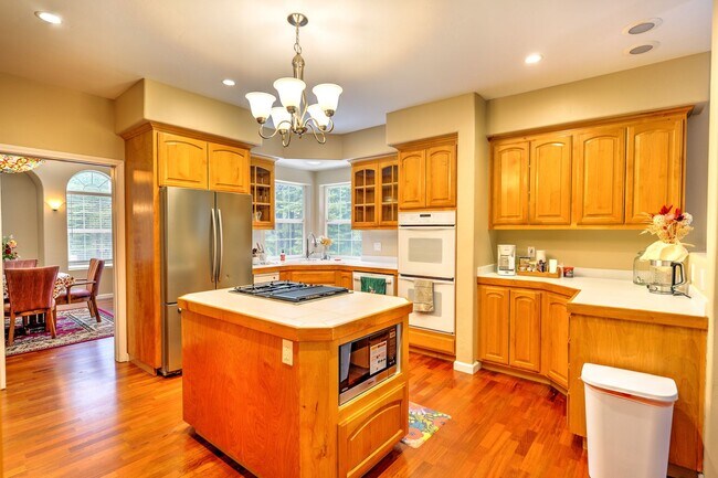 Photo - Large mountain home with 2 car garage and fenced in back yard.