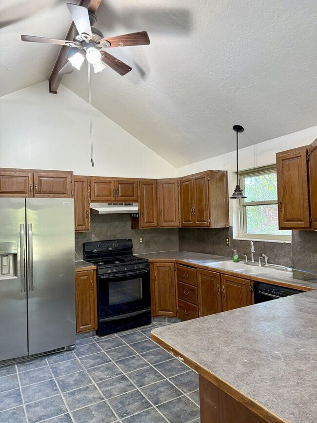Photo - 4 Bed / 3 Bath Home for Rent in Riverdale,...