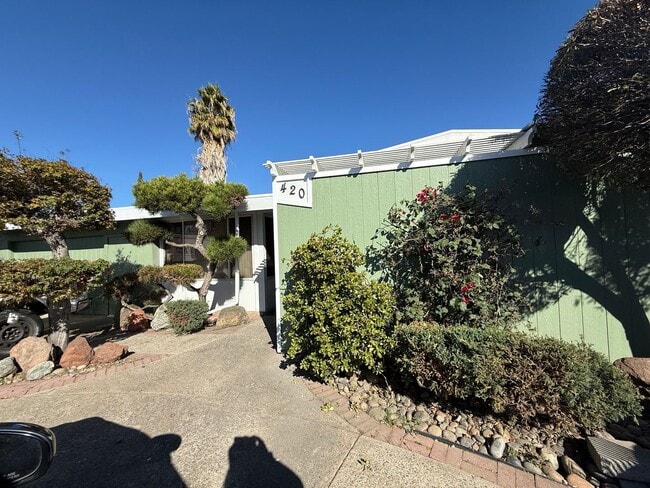 Building Photo - Hard floors, extra closets, patios & fence...