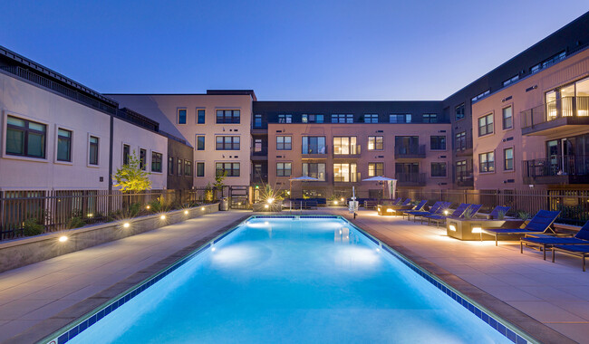 Relax poolside with friends and family - The Fremont Apartments