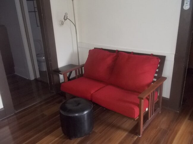 Living room couch on west wall - 924 E Main St Unit 924 one half