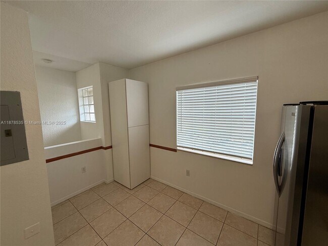 Photo - 5620 NW 114th Path Unit 201
