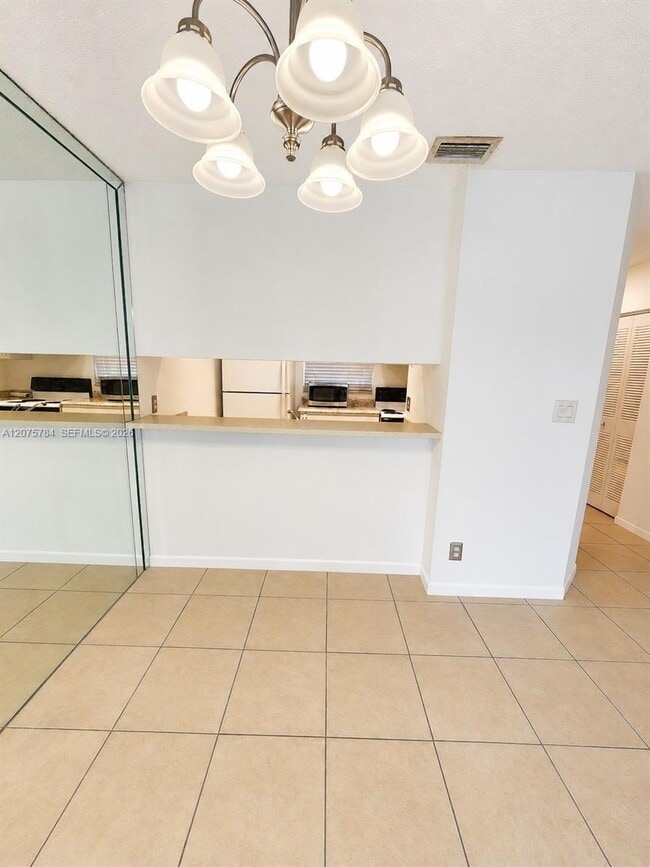 Photo - 3280 NW 102nd Terrace Unit 203-E