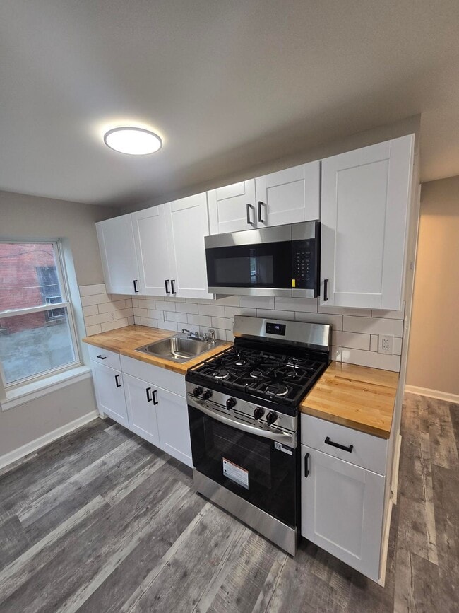 Photo - ? Modern Comfort: 3-Bedroom Living in Hartford’s Friendliest Area ? Unit 1S