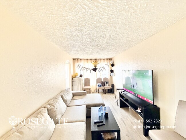 Photo - Spacious 3-Bedroom Main Level Apartment with Backyard & 3 Parking – Cambridge Unit 1