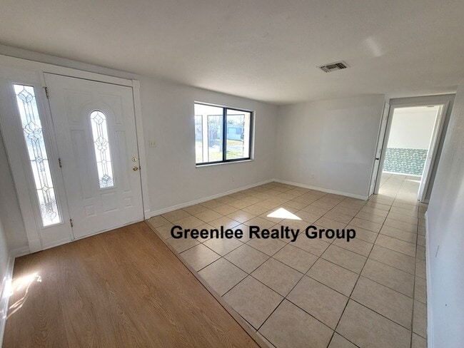 Photo - Spacious 3BR with bonus room and fenced yard just minutes from Tarpon Springs