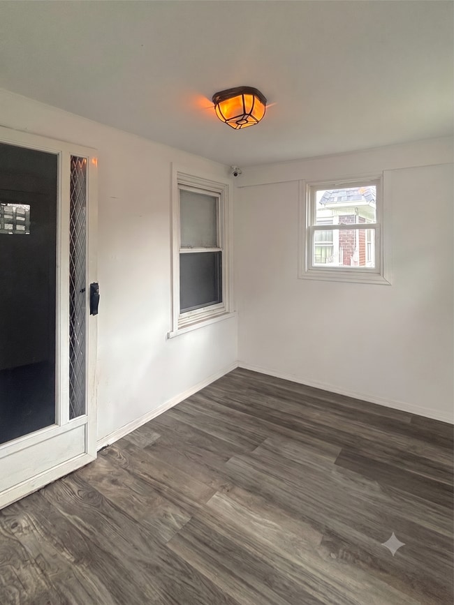 Photo - 4-Bedroom, 1-Bathroom Residence w/ Washer and Dryer