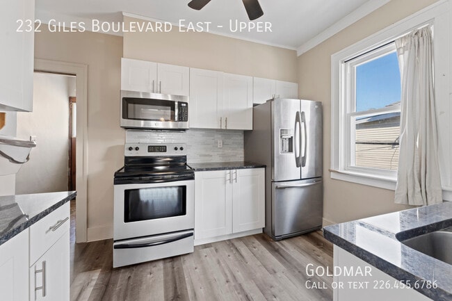 Photo - Updated 3bdrm upper unit in central location Unit Upper