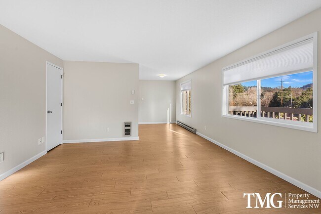Photo - Private, Sunny Townhome | Carpet Free | Parking & Laundry Included Unit 5121