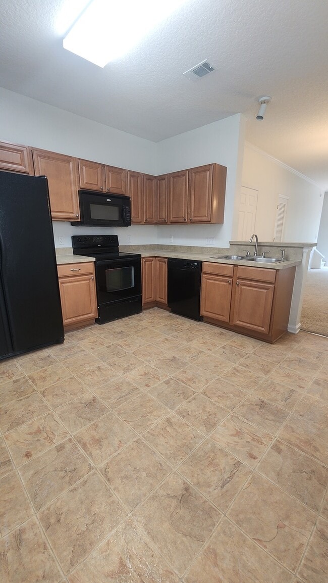 Photo - Lovely 2 bedroom move-in ready condo located in The Gables community!