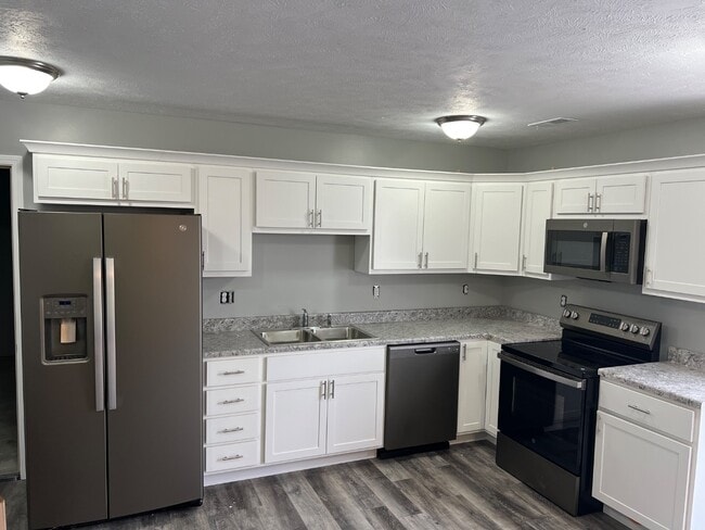 Photo - NP Rentals - 2401 W 18th St #2