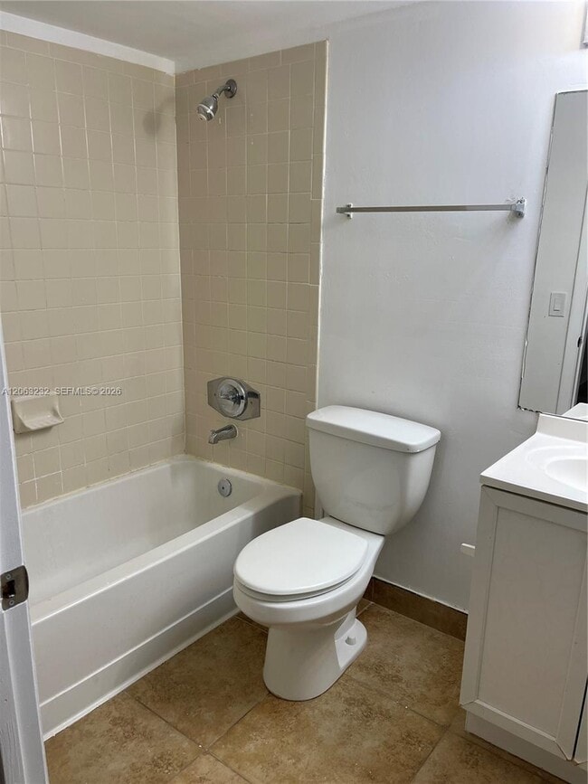 Photo - 9491 Palm Cir S Unit 203