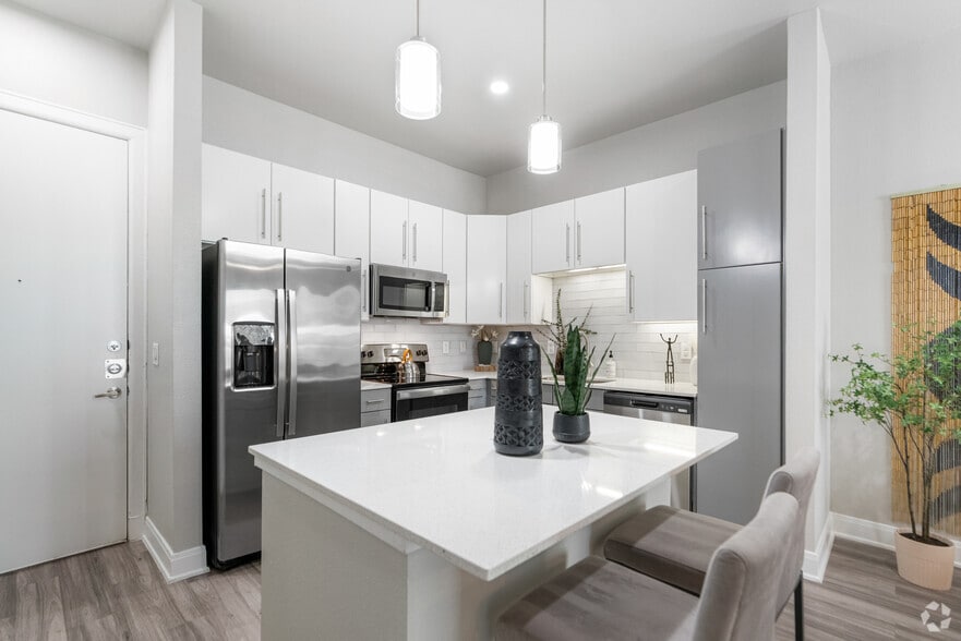 Welcome to SYNC Med Center - 1BR, 1BA - 733SF - Kitchen/Dining Area