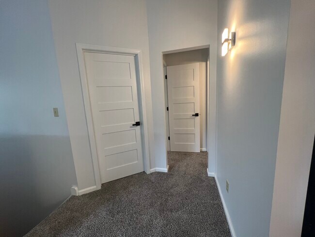 New solid wood doors with new handles throughout - 2402 Stoney Run Trl Unit 2402