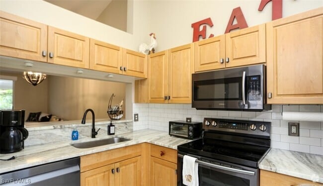Building Photo - 6645 Huntington Lakes Cir Unit 201 Rental