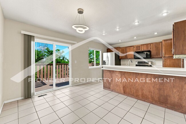 Photo - Spacious Home with Central AC and 2-Car Garage