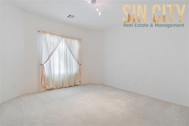 Photo - "Charming 3-Bed Haven with 1,718 Sq. Ft. of Comfort in Sun City Aliante!"