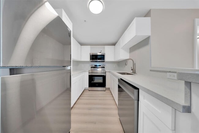 Photo - 185 SE 14th Terrace Unidad 2008