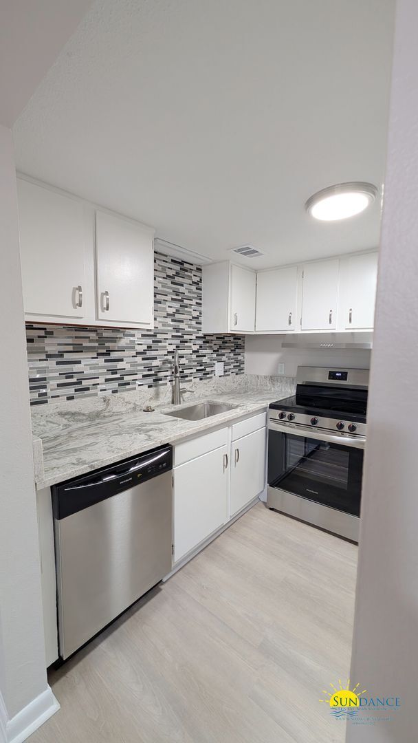 Photo - Expansive waterfront covered patio off this fully renovated Fort Walton Condo!