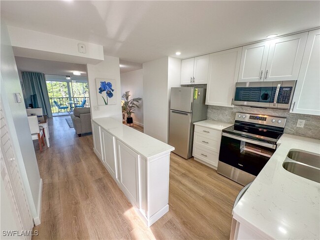 Building Photo - 4380 27th Ct SW Unit 311 Rental