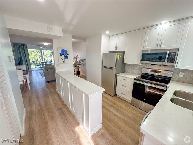 Building Photo - 4380 27th Ct SW Unit 311 Rental
