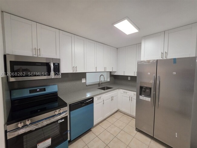Building Photo - 8400 SW 133rd Avenue Rd Unit 208